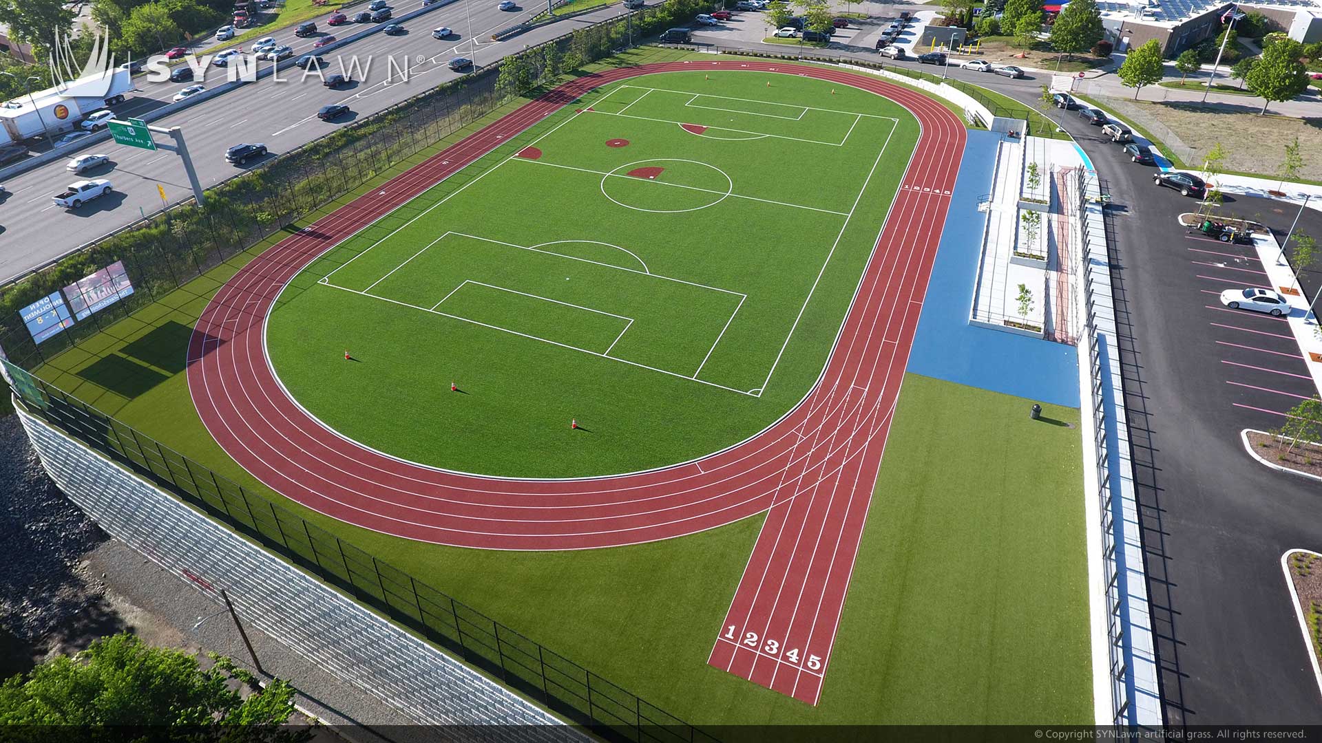image of SYNLawn Honolulu HI sports agility artificial grass with running track and field
